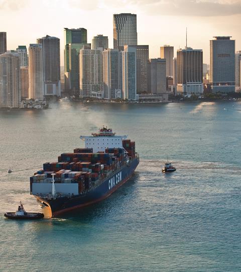 Cargo ship with Miami skyline